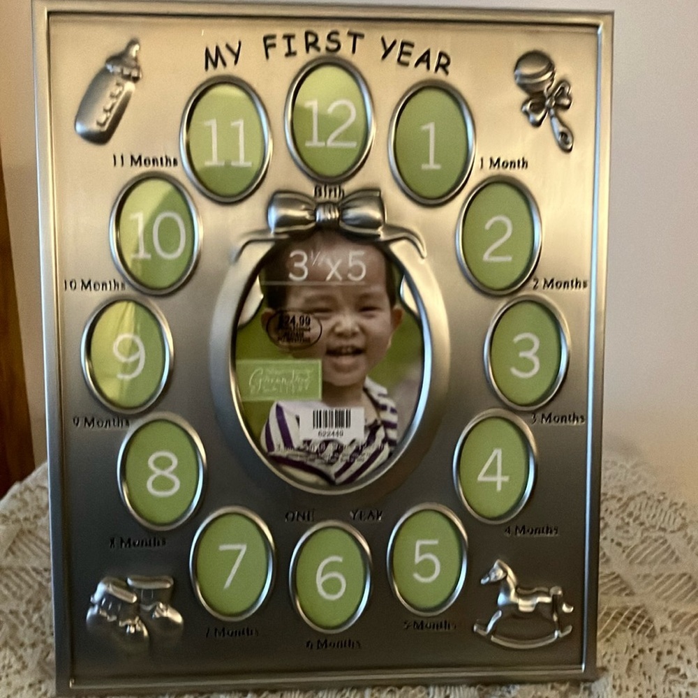 Baby’s First Year Photo Frame- Silver Finish 1 - 3”x5” 12 1.5”x2” openings New
